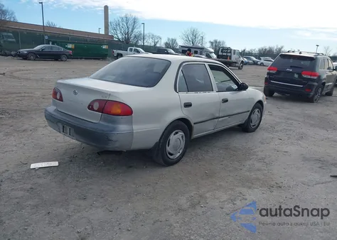 2001 Toyota Corolla Ce из США, поврежденный, VIN 2T1BR12E71C476234